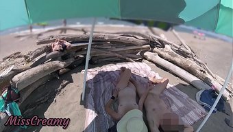 An Exhibitionist Wife Gets Naked On The Nudist Beach And Gets Caught